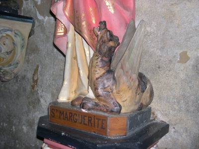 Sainte Marguerite d'Antioche, statue, détail du dragon église Saint-Nicolas de Civray (Vienne)